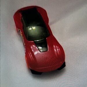 Sleek Red Toy Car with Black Details